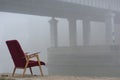 Bridge over the river in the fog. Lonely man under the bridgeÃÂ¼ Royalty Free Stock Photo