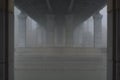 Bridge over the river in the fog. Lonely man under the bridgeÃÂ¼ Royalty Free Stock Photo