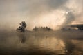 Bridge over the river in a fog Royalty Free Stock Photo