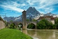 Bridge over river Gave de Pau in Orthez and Pic du midi Ossau - France