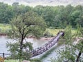 Bridge over the river in the mountainous Altai, Russia