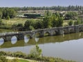 Bridge over the river Pisuerga passing through the beautiful village of Simancas, Valladolid, Spain