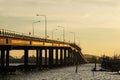 Bridge over river, sea morning sun rise, boat, elephant flag Thailand Royalty Free Stock Photo