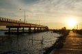 Bridge over river, sea morning sun rise, boat, elephant flag Thailand Royalty Free Stock Photo