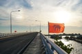 Bridge over river, sea morning sun rise, boat, elephant flag Thailand Royalty Free Stock Photo