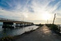 Bridge over river, sea morning sun rise, boat, elephant flag Thailand Royalty Free Stock Photo