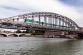 Bridge over river Seine in Paris with subway passing Royalty Free Stock Photo