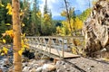 Bridge in a mountain forest during autumn Royalty Free Stock Photo