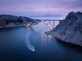 Bridge over the sea at sunset. Aerial view of modern Krk bridge Royalty Free Stock Photo