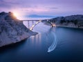 Bridge over the sea at sunset. Aerial view of modern Krk bridge Royalty Free Stock Photo