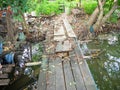 Bridge over sewage,Walkway go to the forest,Made of wood,At market Bangkachao Bangkok Thailand Royalty Free Stock Photo