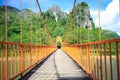 Bridge over song river in Laos Royalty Free Stock Photo