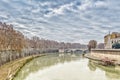 Bridge over the Tiber river in the center of Rome Royalty Free Stock Photo