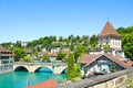 Bridge over turquoise Aare River in the historical old town of the Swiss capital Bern. Historical buildings along the river. Royalty Free Stock Photo