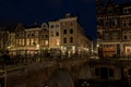 Bridge over Utrecht Oudegracht canal at night