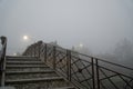 Bridge over the water canal in the autumn, haze weather, foggy morning in the national park