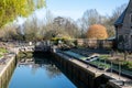 Bridge over the water at Iffley Lock in the picturesque village of Iffley on the River Thames in Oxfordshire, UK Royalty Free Stock Photo