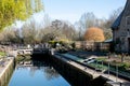 Bridge over the water at Iffley Lock in the picturesque village of Iffley on the River Thames in Oxfordshire, UK Royalty Free Stock Photo