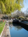 Bridge over the water at Iffley Lock in the picturesque village of Iffley on the River Thames in Oxfordshire, UK Royalty Free Stock Photo