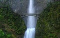 Bridge over the waterfall. Royalty Free Stock Photo