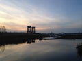 Bridge over Wetlands and Hackensack River during Sunset in Jersey City, NJ. Royalty Free Stock Photo