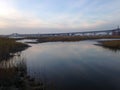 Bridge over Wetlands and Hackensack River during Sunset in Jersey City, NJ. Royalty Free Stock Photo