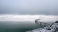 Bridge over wintry lake