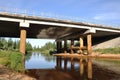 Bridge over the yellow river in summer and his reflection Royalty Free Stock Photo