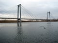 Bridge over the Yenisei River in city of Krasnoyarsk. Communal bridge Royalty Free Stock Photo