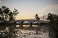 Bridge in the park to watch the sunset at Ban Tharae Sakon Nakhon, Thailand Royalty Free Stock Photo