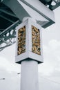 bridge pillars patterned and gold colored