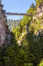 Bridge of Queen Mary or Marienbrucke over Alpine gorge near Neuschwanstein castle, Bavaria, Germany. Mountain landscape with chasm