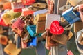 Locks of love on bridge railing Heart-shaped lock