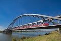 Bridge and red train over Rhein