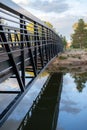 Bridge and reflection in the water at the Gillette Fishing Lake