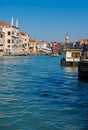 Bridge Rialto on Grand canal famous landmark panoramic view Venice Italy with blue sky white cloud and gondola boat water. Royalty Free Stock Photo