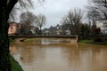 Bridge and river called FIUME BACCHIGLIONE in Vicenza City in northern Italy during flood