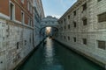 The Bridge of Sighs, famous bridge connects the DogeÃ¢â¬â¢s Palace to the prison, in Venice, Italy with gondolas Royalty Free Stock Photo