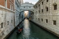 The Bridge of Sighs, famous bridge connects the DogeÃ¢â¬â¢s Palace to the prison, in Venice, Italy with gondolas Royalty Free Stock Photo