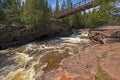 Bridge Spanning a Dramatic Cascade Royalty Free Stock Photo