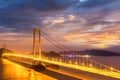 Bridge spanning the sea in nightfall Royalty Free Stock Photo