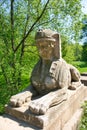 Bridge with a sphinx statue. Veltrusy. Czech Republic. Royalty Free Stock Photo