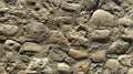 A bridge street made of small rounded stones in the center of the old city. The gray cobblestones are laid out in order, like road Royalty Free Stock Photo