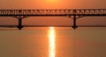 The bridge at sunset on the Irrawaddy River Royalty Free Stock Photo