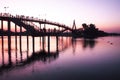 Bridge at sunset .Vanilla sky in blur and pink shade with crowd on the bridge . silhouette photography