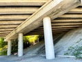 Bridge support columns under the freeway Royalty Free Stock Photo