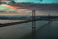 Bridge of 25th April with cars after sunset