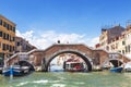 A bridge of Three Arches crosses the Cannaregio canal, which connects the Venetian lagoon and the Grand canal, Venice