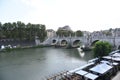 Bridge on Tiber river Rome Italian landscape city center and cafes Royalty Free Stock Photo