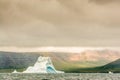 A Lone Iceberg stands winess to the Arctic Tundra